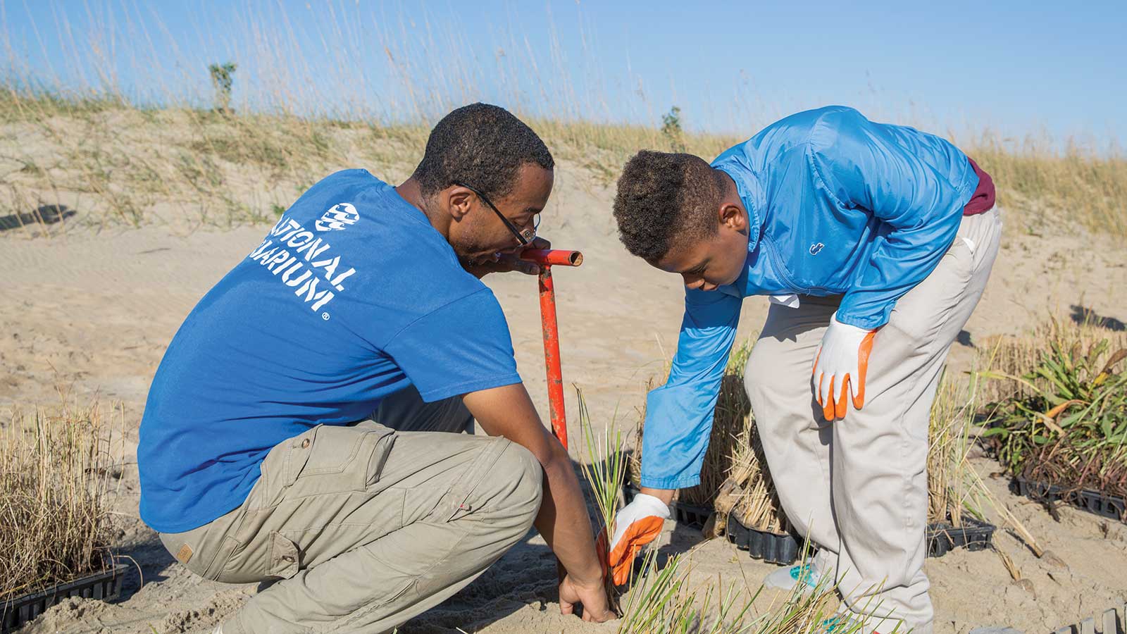 Curtis Bennett doing a service project at a beach