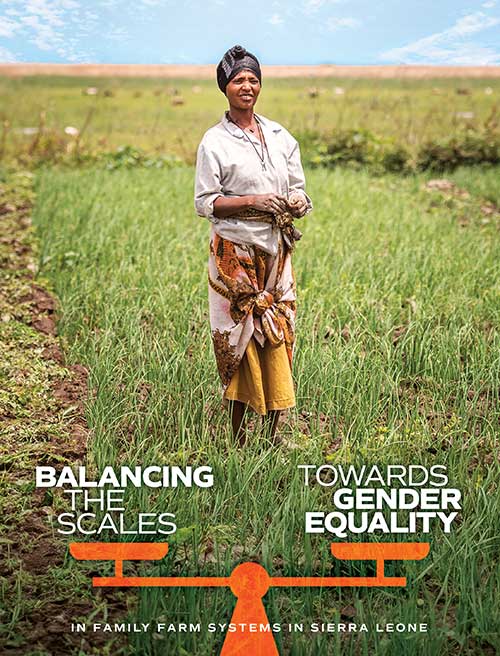 African woman standing in farm field