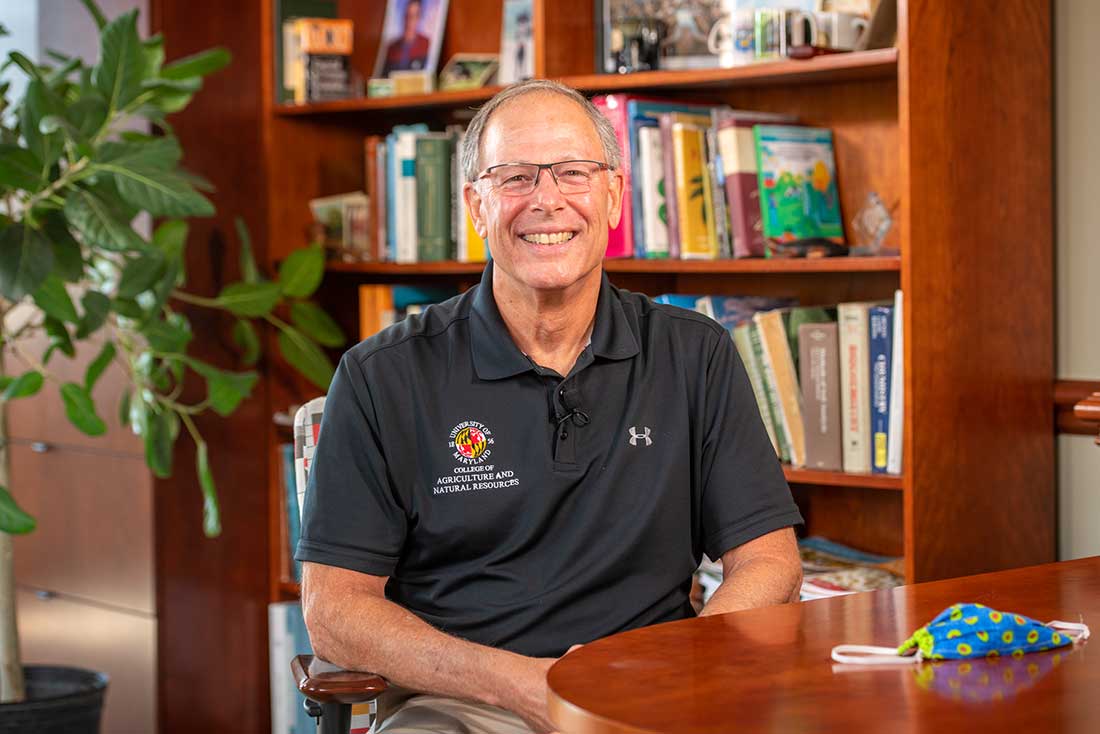 Photo of Dean Beyrouty at his desk