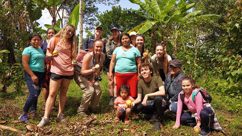 Group of students with local hosts