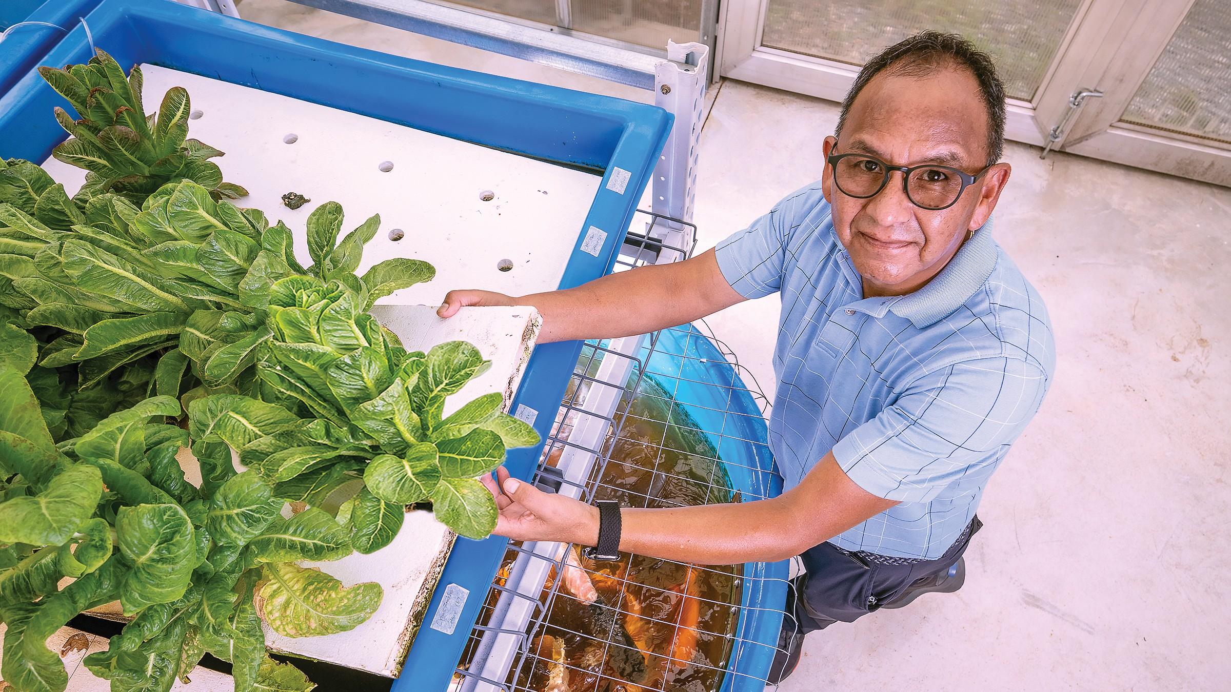 Faculty in the aquaponics lab