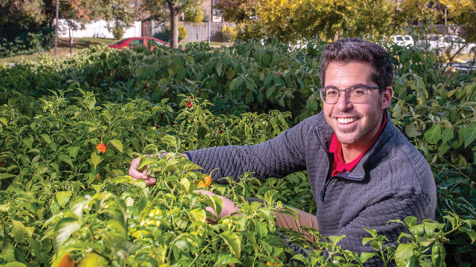 Ryan Blaustein in a garden